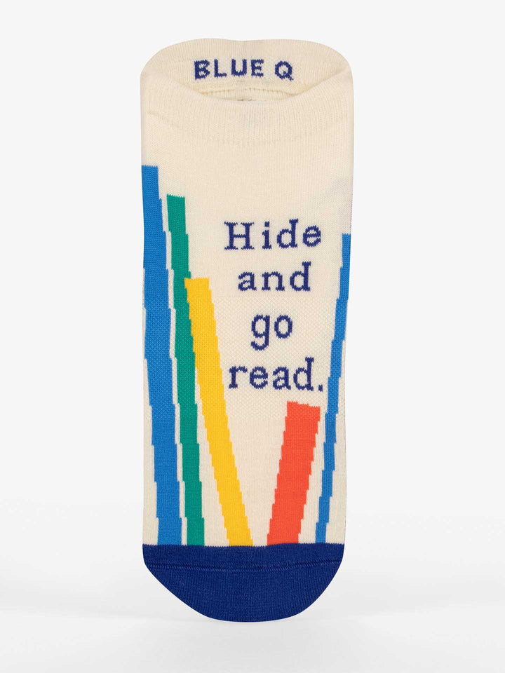 Women's Hide and go read sneaker socks, flat single view with text and spines