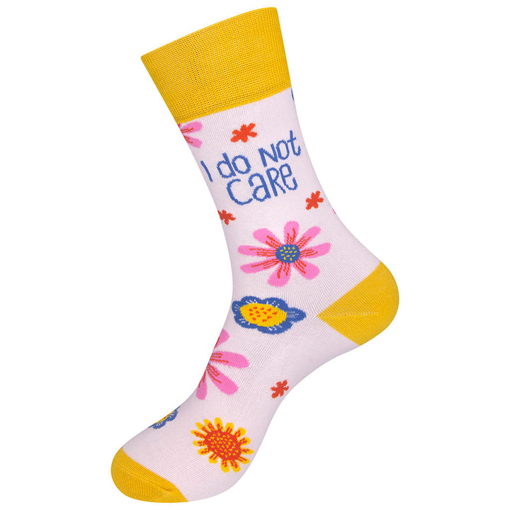 I Do Not Care pink socks left foot detail showing gold heel and toe