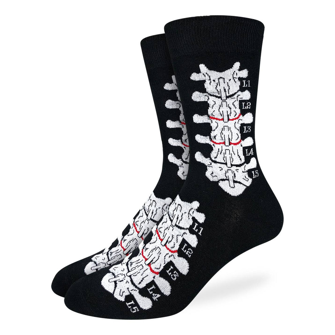 Men's chiropractor crew socks in black with white anatomical lumbar vertebrae labeled L1 to L5, flat product view