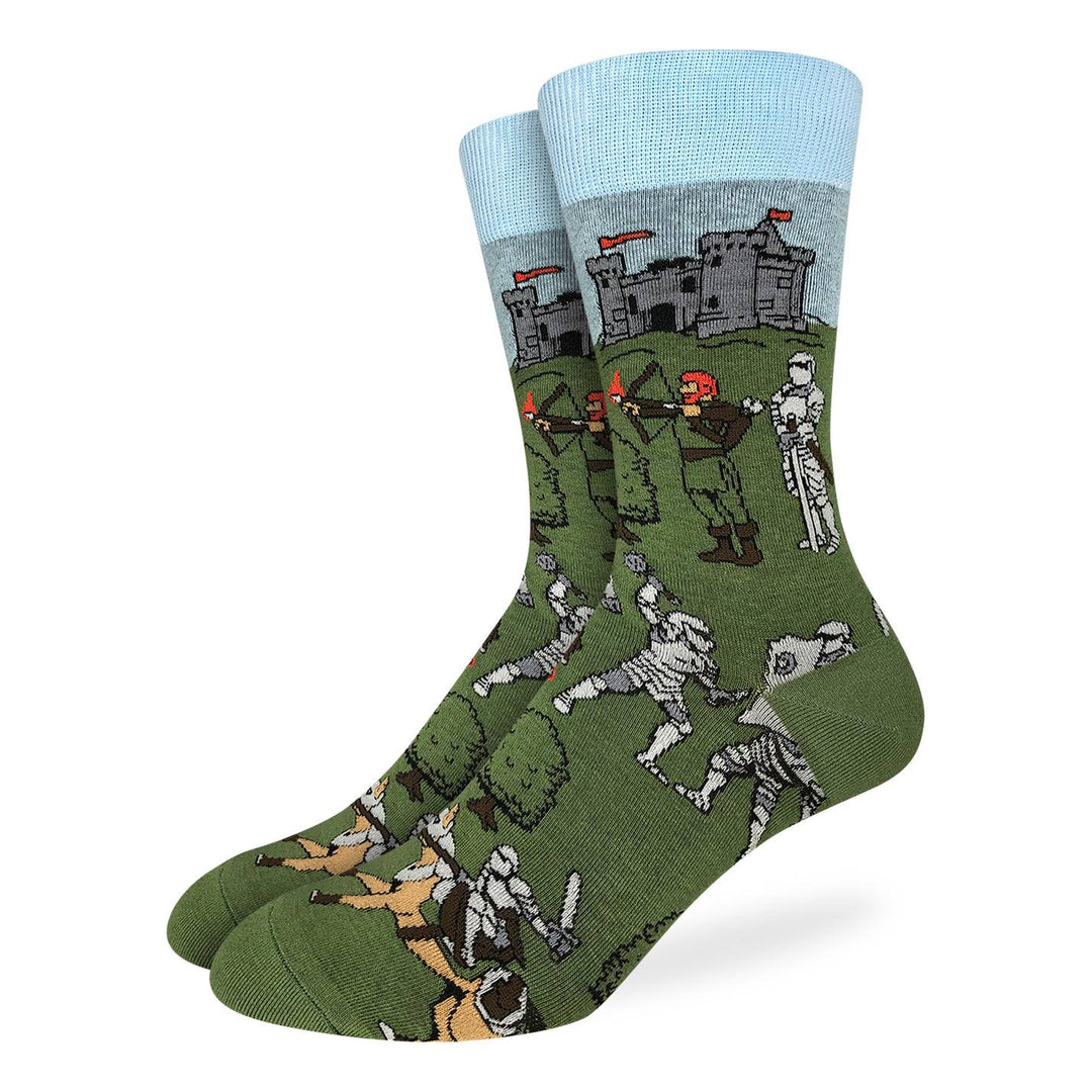 Men's medieval knights crew socks in green with a grey castle, archers and armored knights, flat product view