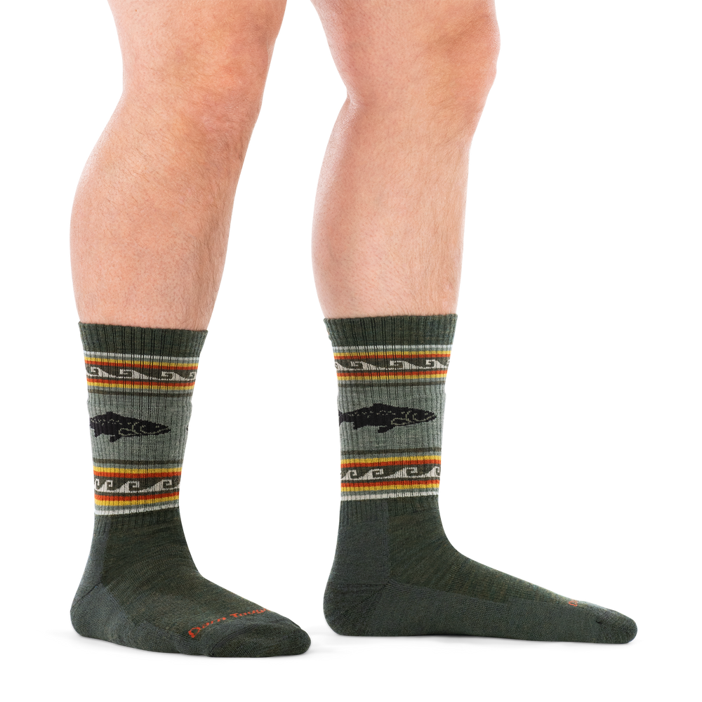 Man standing barefoot wearing men's trout river boot socks