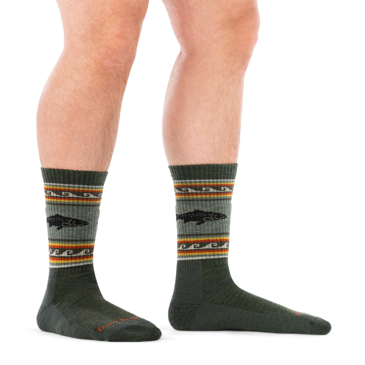 Man standing barefoot wearing men&