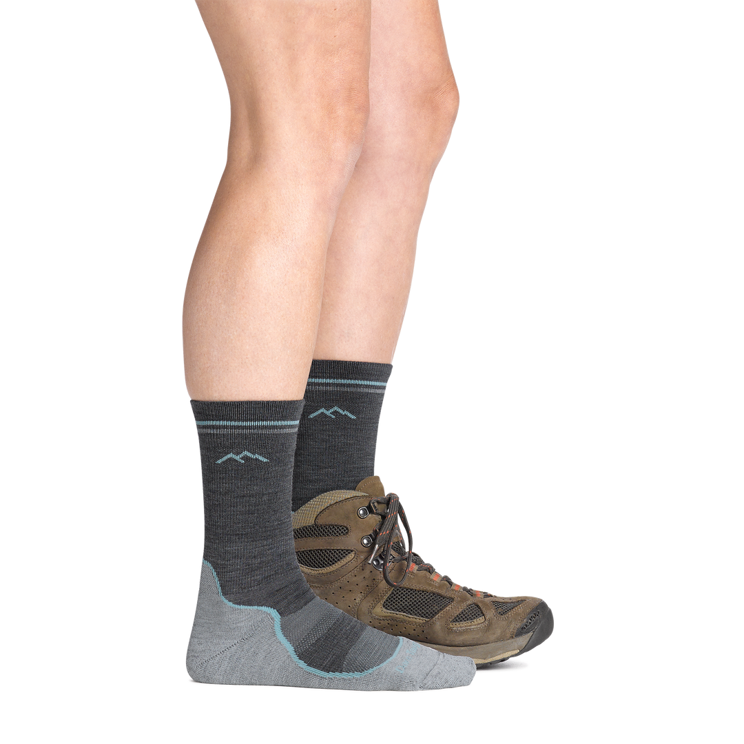 Person wearing Light Hiker Boot socks in slate in hiking boot