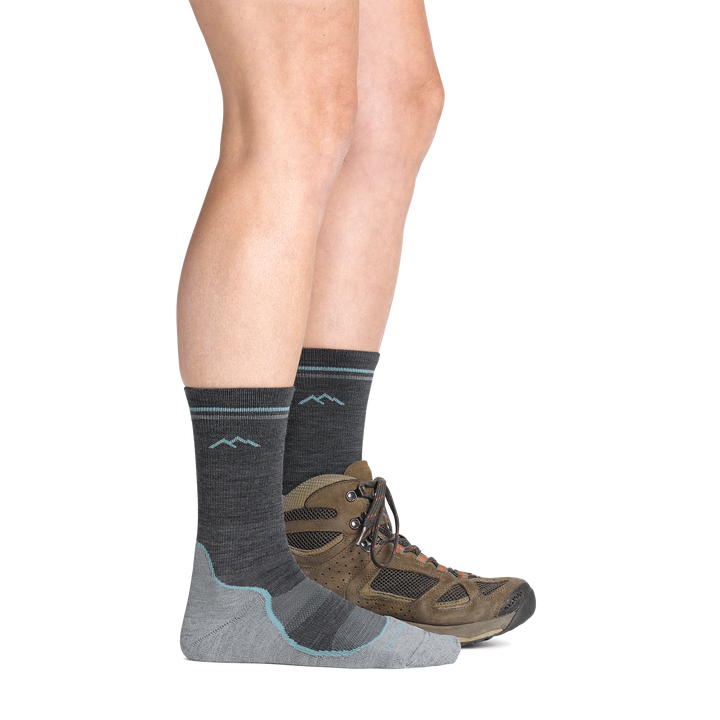 Person wearing Light Hiker Boot socks in slate in hiking boot