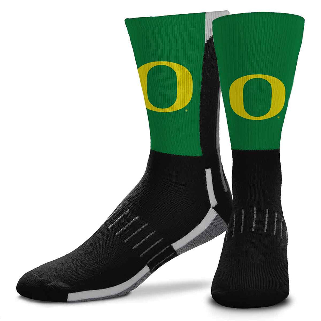 Kids' University of Oregon Ducks crew socks in green and black with yellow O logo, flat pair view