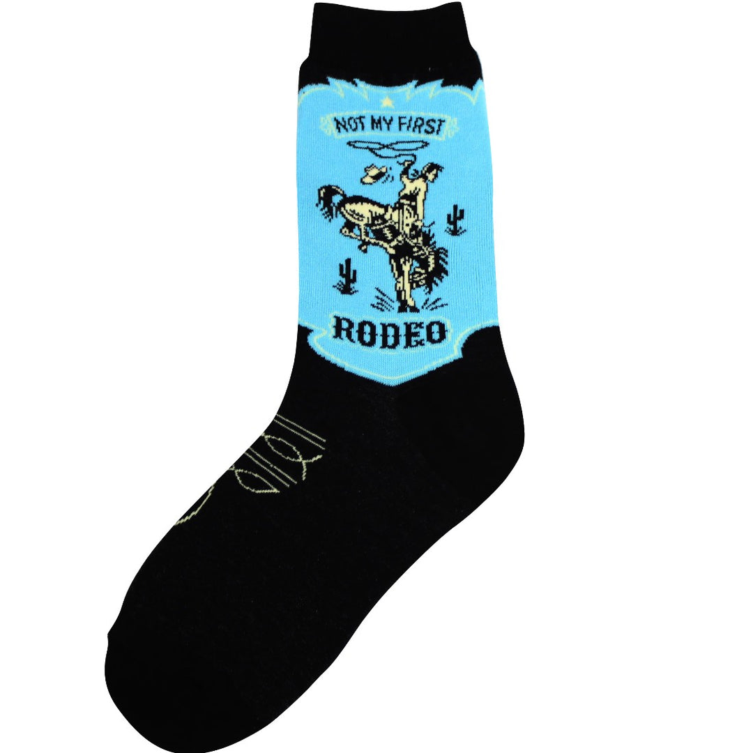 Women's rodeo crew socks in black and blue, flat view showing bucking bronco cowboy and 'Not My First Rodeo' text