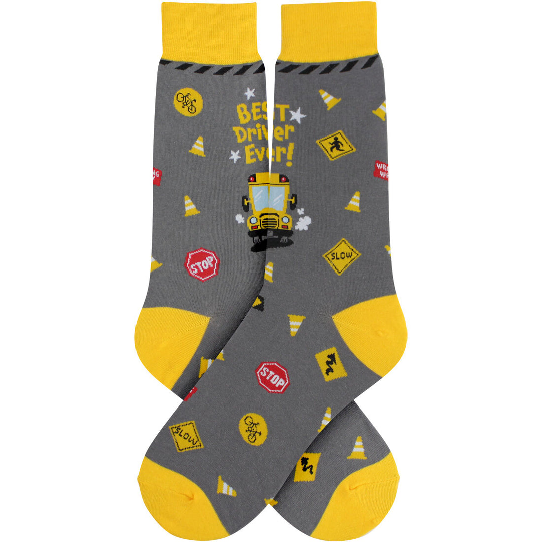 Men's bus driver crew socks with yellow bus and traffic signs on grey, flat product shot