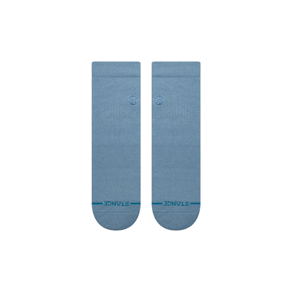 Women's Icon quarter socks in windward blue, flat front view showing tonal logo dot and teal Stance wordmark above the toe