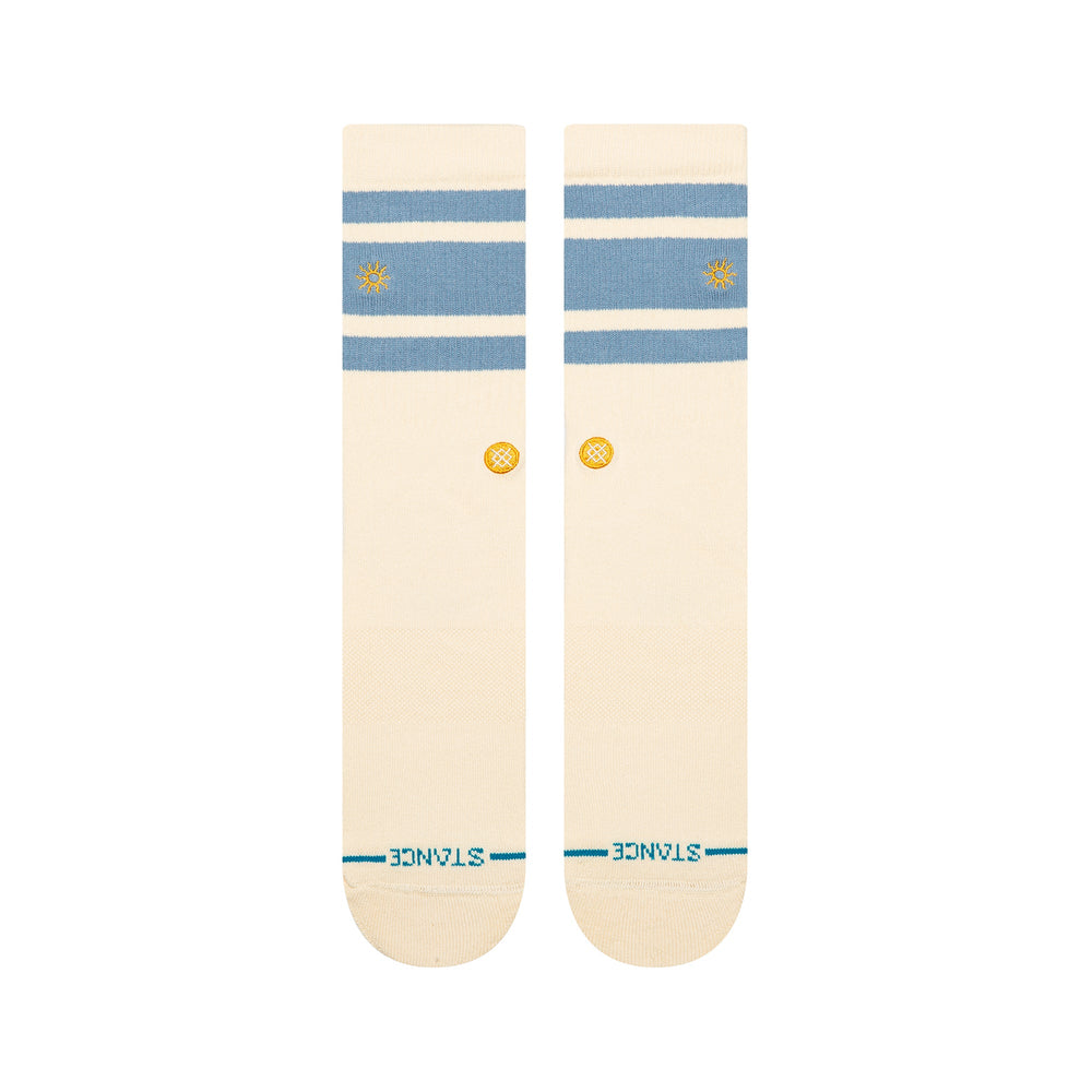 Men's Got Sol crew socks, flat front view showing dusty blue varsity stripes, embroidered gold sun and gold Stance logo dot