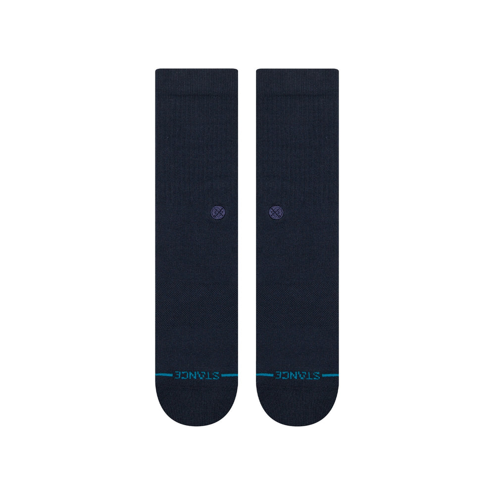 Men's solid navy Icon crew socks, back view of pair flat lay