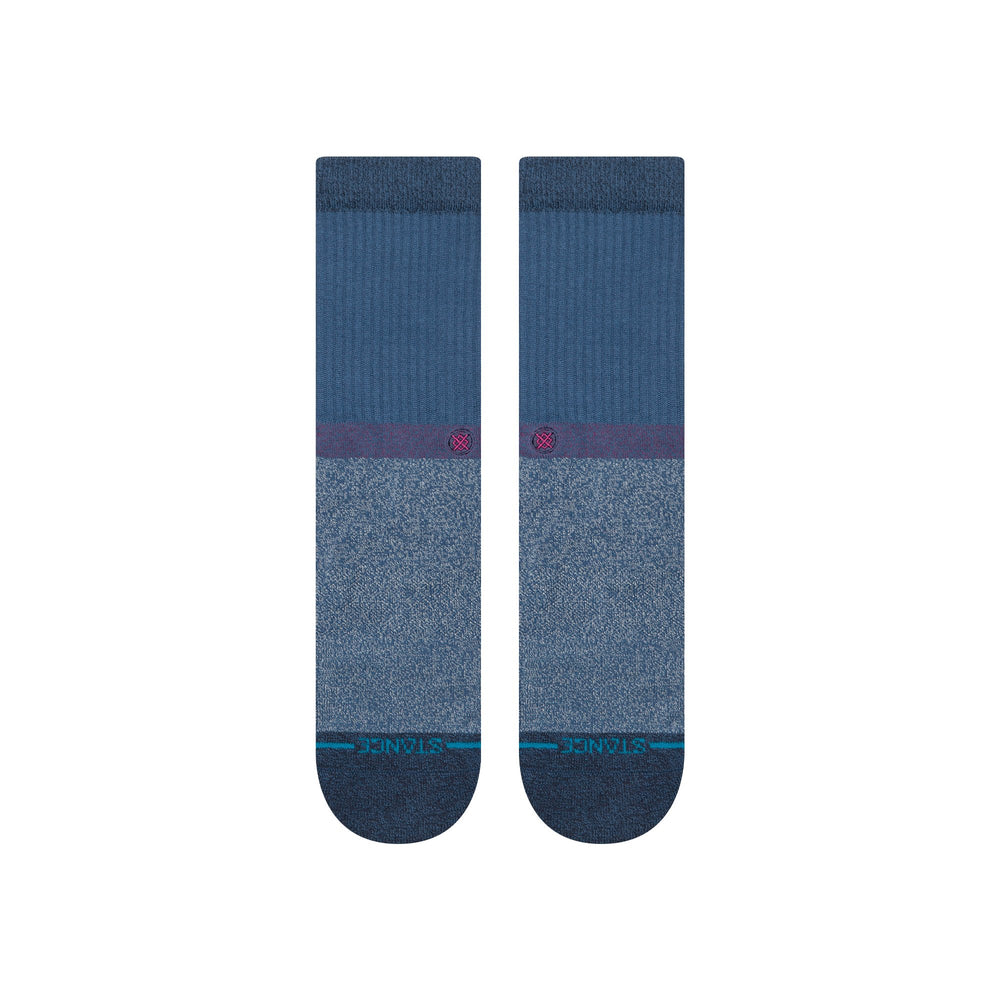 Women's solid blue crew socks flat lay close-up of the foot