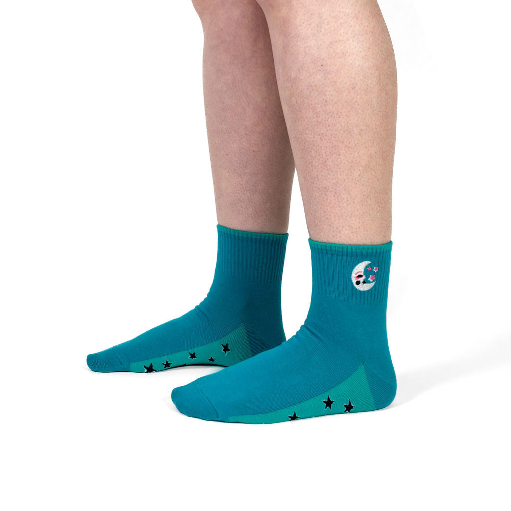 Moon And Stars women's quarter crew socks with moons and stars, model side view