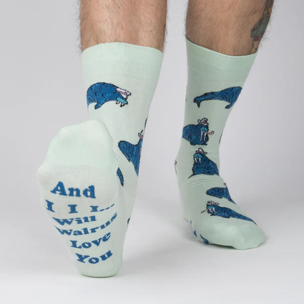 Men's walrus crew socks worn, side view with pun text on the sole
