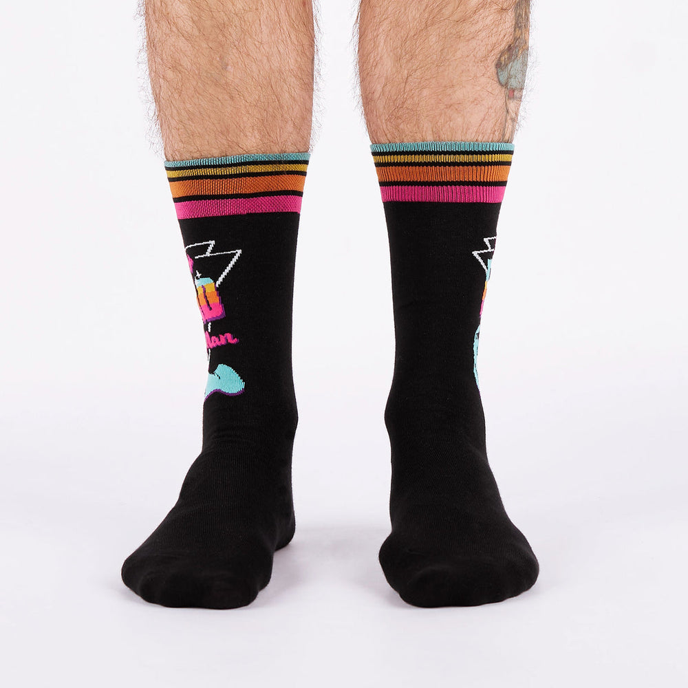 Men's 'Stay Rad, Man' manatee crew socks worn, front view