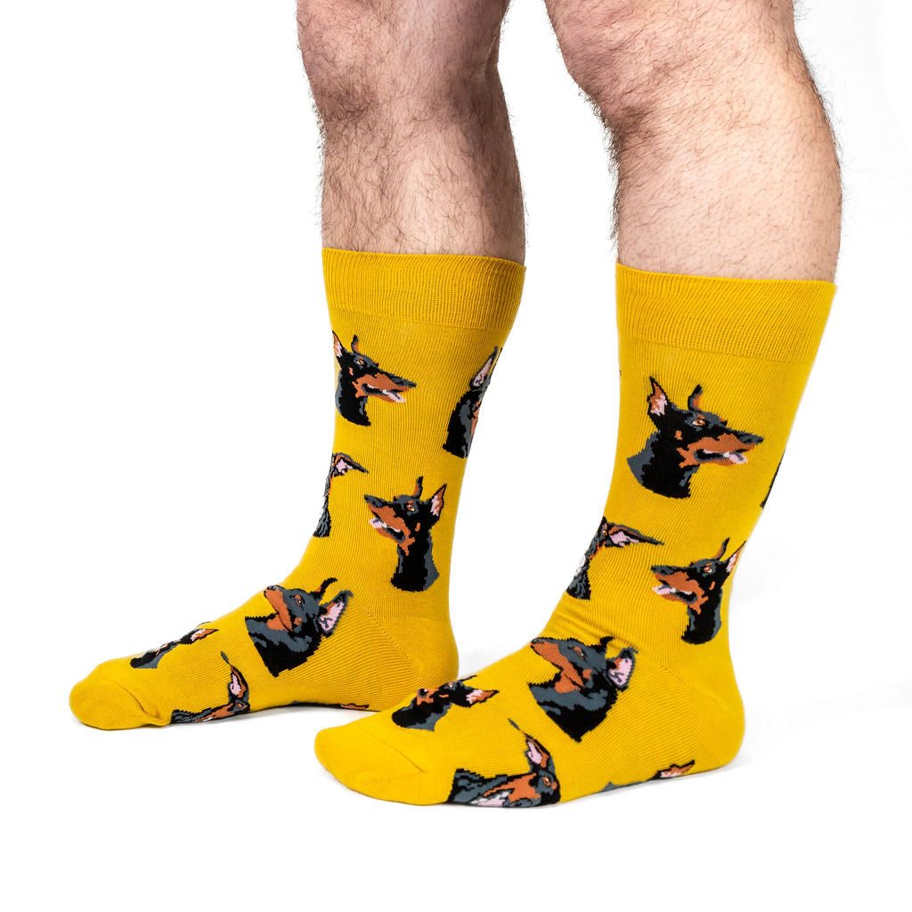 I Like Dobermans men's crew socks with Dobermans, model side view