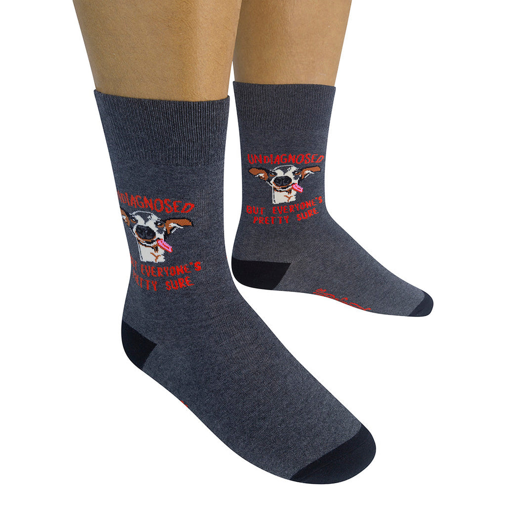 Person wearing Undiagnosed socks showing funny dog design