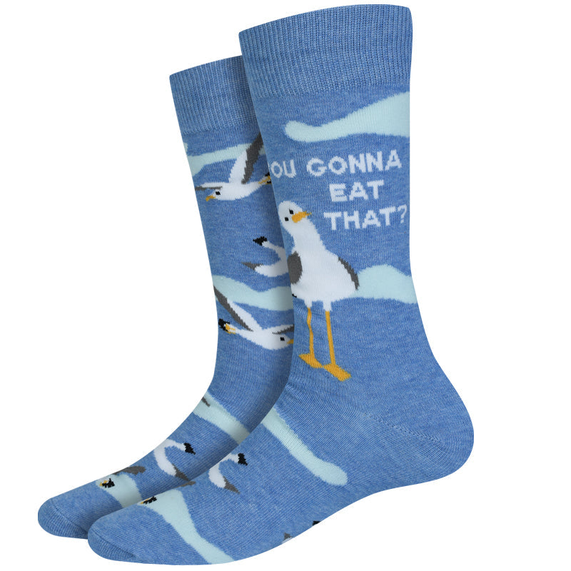 Men's seagull crew socks, flat pair view with seagulls and 'You Gonna Eat That?' text on blue
