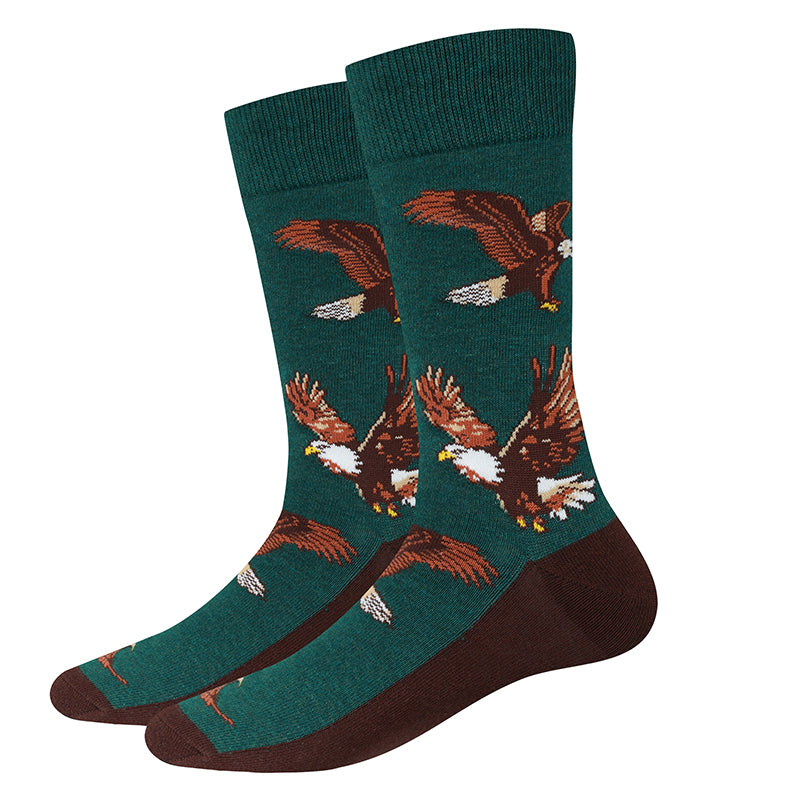 Bald Eagle green men's crew socks with a soaring bald eagle, flat product shot