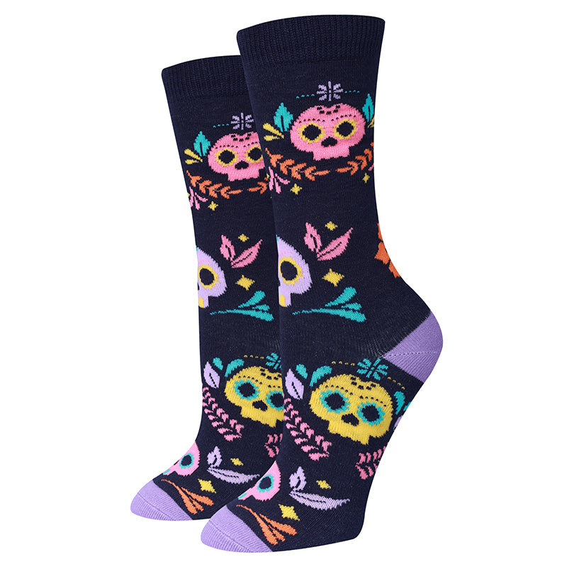 Sugar Skull purple women's crew socks with Day of the Dead calaveras, flat product shot