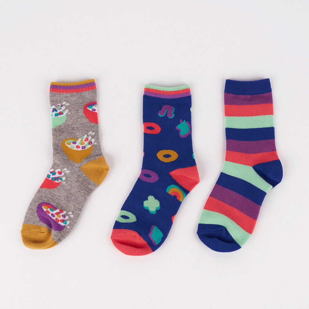 Kids' cereal junior crew socks 3-pack laid flat showing gray, navy and rainbow-striped designs