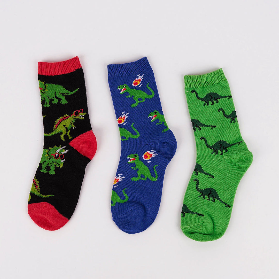 Kids' dinosaur junior crew socks 3-pack laid flat in black, blue and green designs