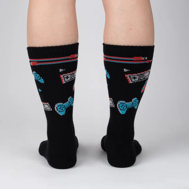 Men's video game athletic crew socks worn, back view of controller pattern
