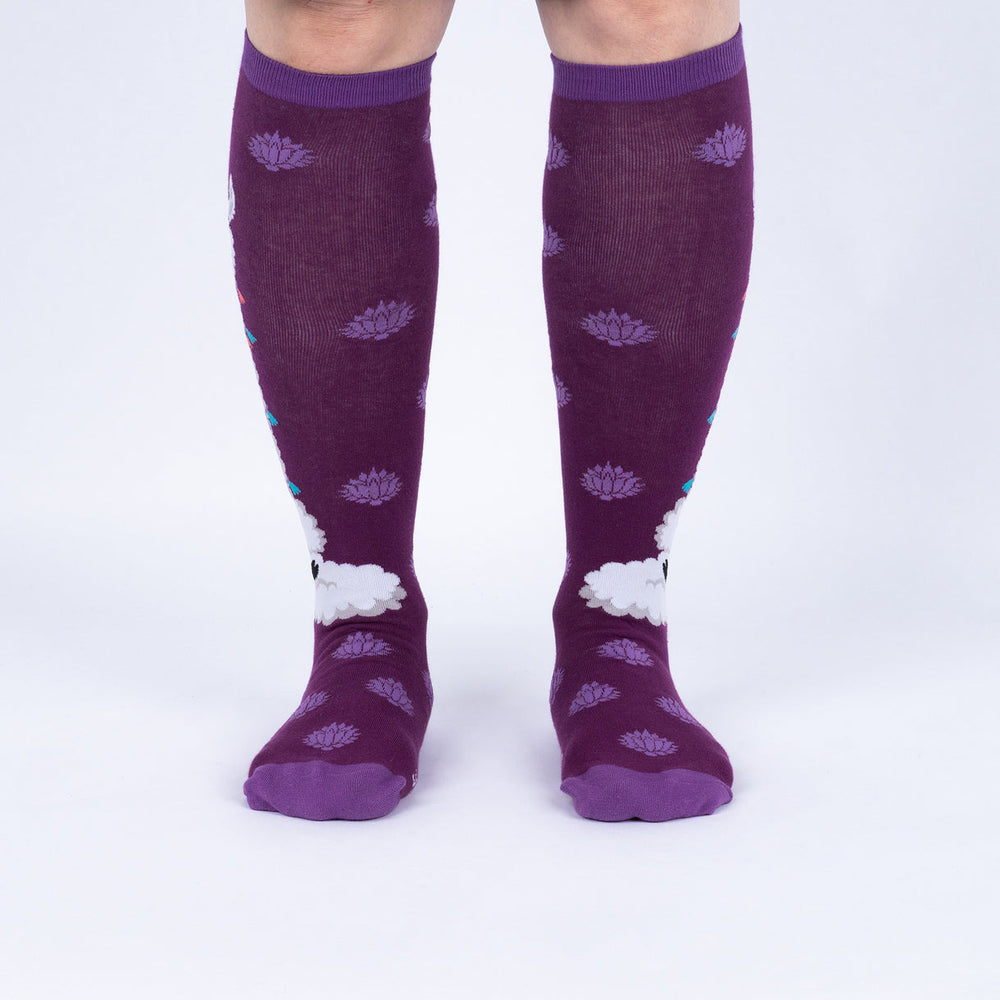 Women's zen llama knee high socks worn, front view on legs