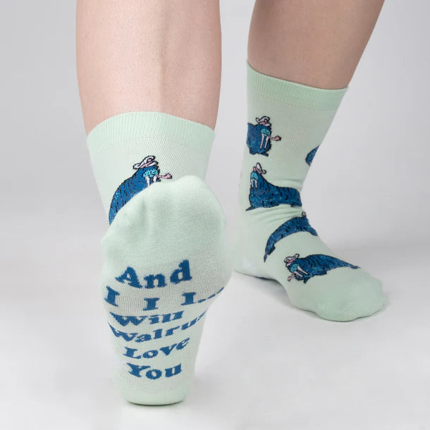 Women's walrus crew socks worn, sole view with power-ballad pun text