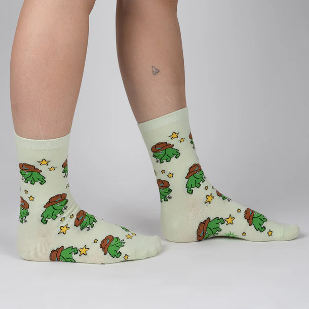 Women's cowboy frog crew socks worn, side view, mint green with hat-wearing frogs