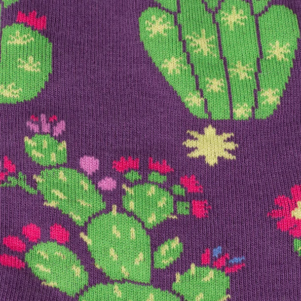 Women's cactus crew socks close-up of green cactus paddles with pink and yellow flowers