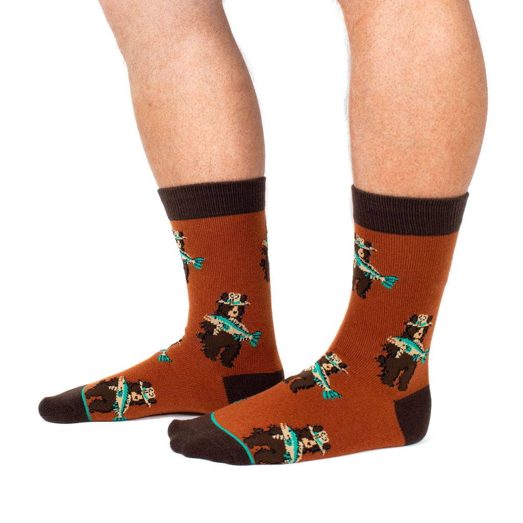 What a Catch! unisex wool crew socks with a bear fishing, model side view