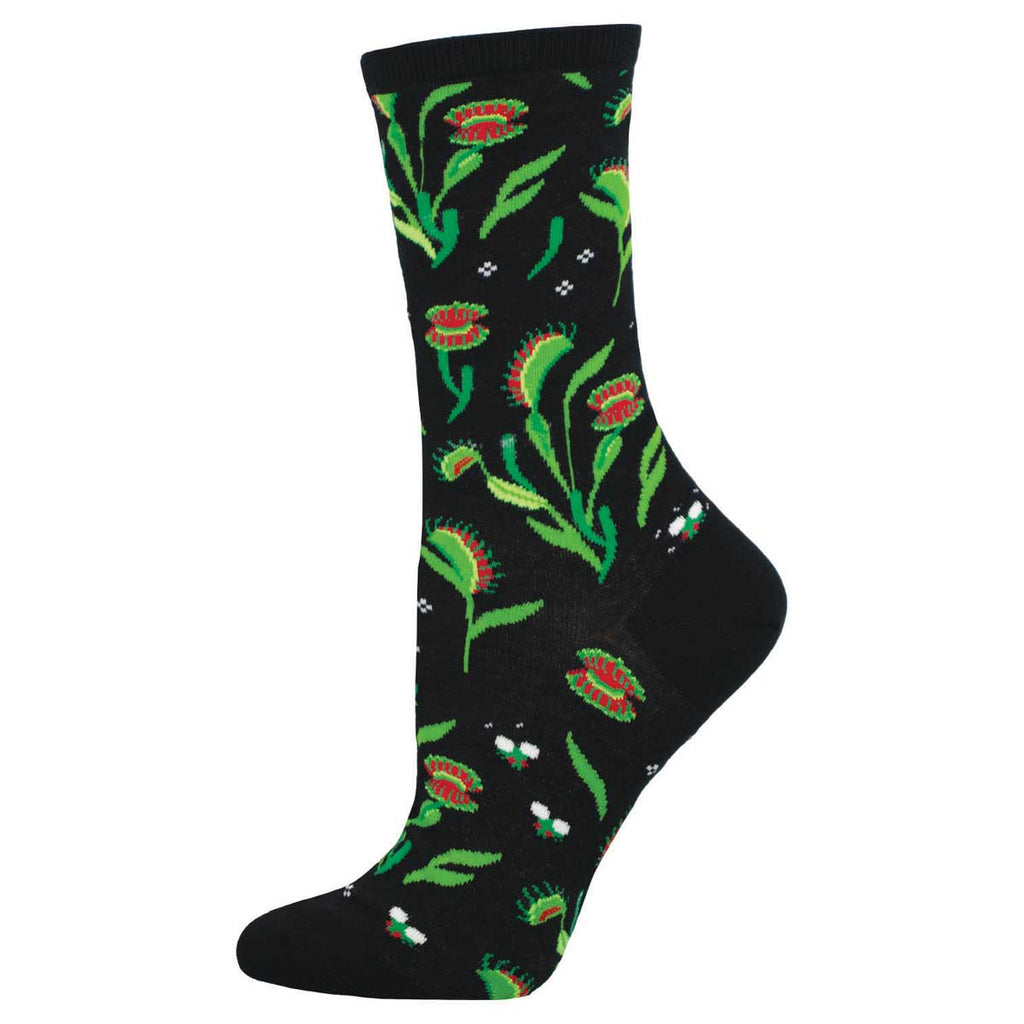 Women's Venus flytrap crew socks, flat side view, green carnivorous plants with red traps on black