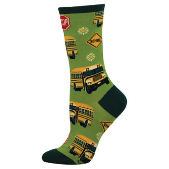 Women's school bus crew socks, flat side view, yellow school buses with stop and crossing signs on green