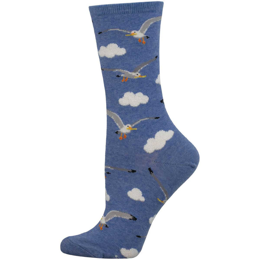 Women's seagull crew socks, flat side view, white gulls flying among clouds on heather blue