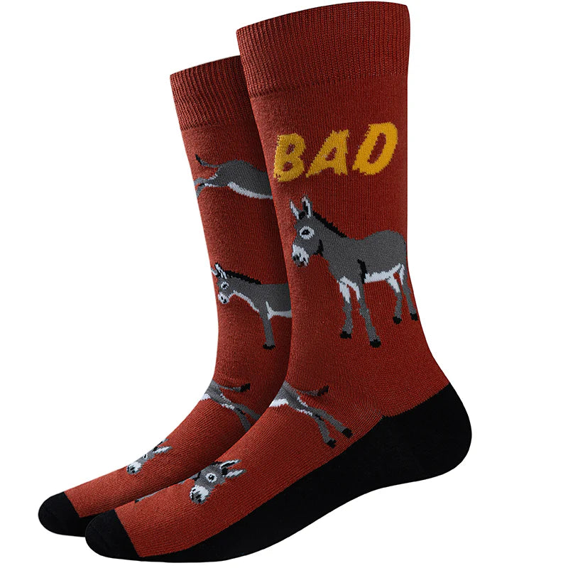 Men's donkey crew socks in rust red with BAD text, flat lay