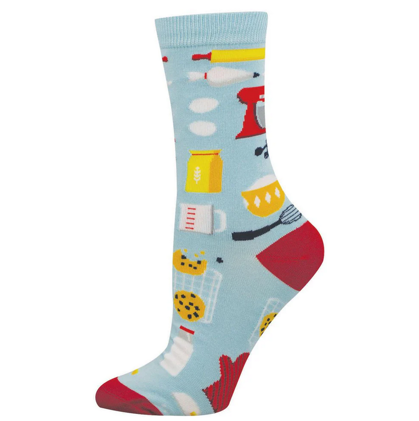 Women's baking crew socks laid flat, light blue with a red stand mixer, cookies, and baking tools