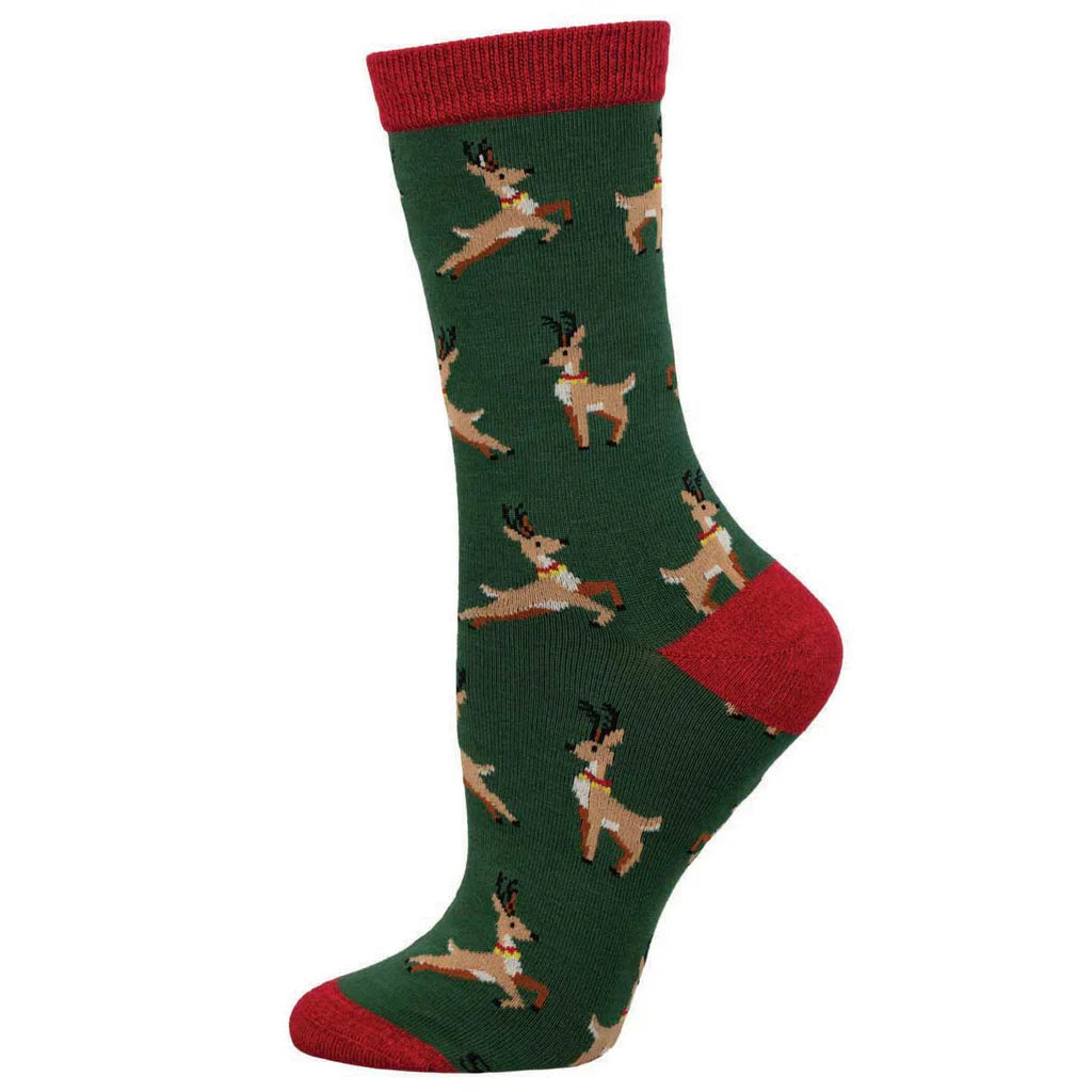 Women's reindeer crew socks in green with leaping deer, flat lay