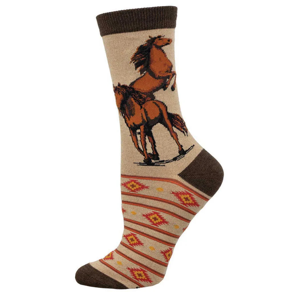Women's wild horses crew socks in tan with Southwestern foot pattern, flat lay