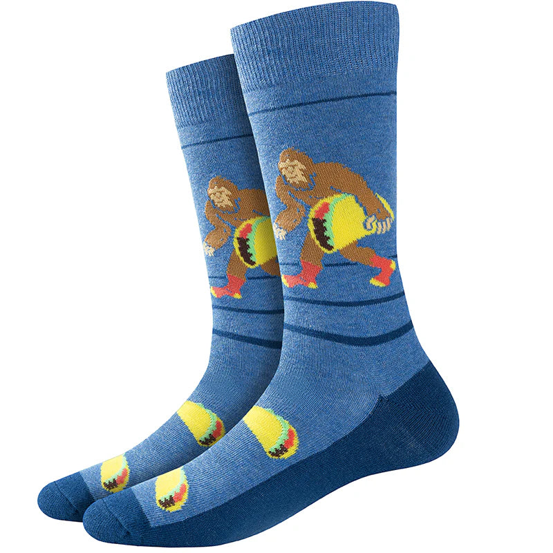 Unisex Bigfoot taco crew socks in blue, flat lay