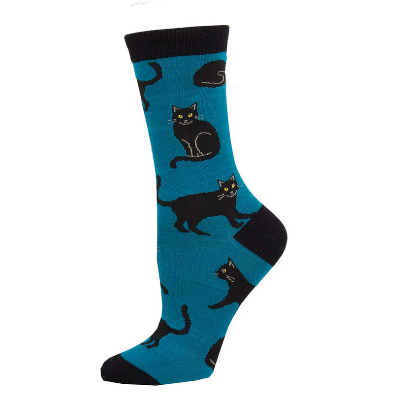 Women's black cat crew socks laid flat, teal with black cats sitting and prowling with yellow eyes
