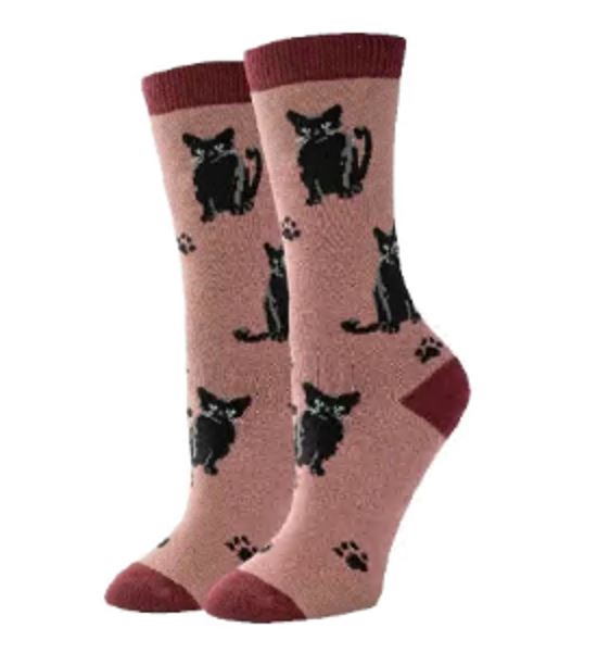 Women's black cat crew socks in dusty rose, flat lay showing black cats and paw prints