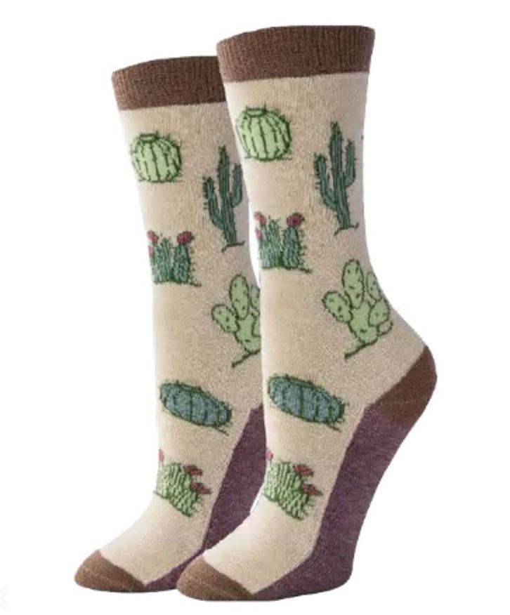 Women's cactus crew socks in oatmeal, flat lay showing assorted desert cacti and pink blooms