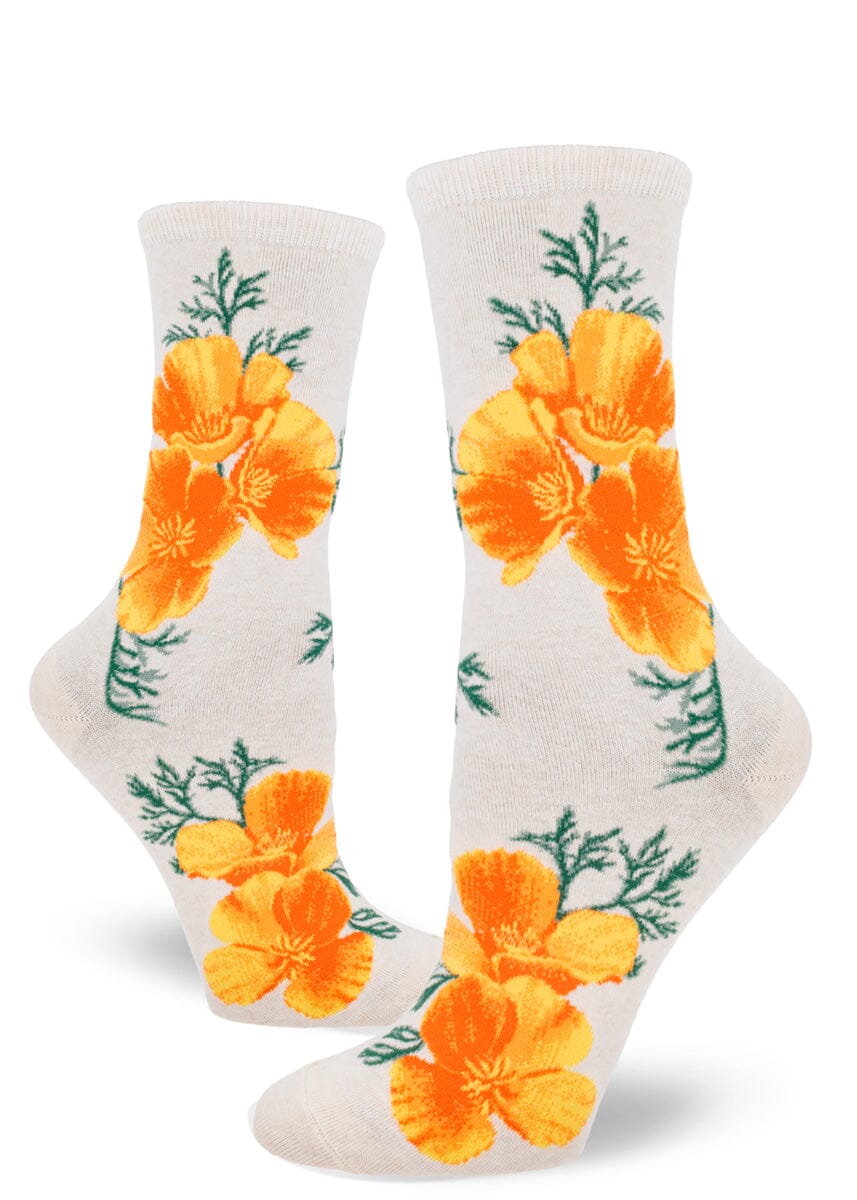 Women's California poppy crew socks shown flat on cream with orange poppies