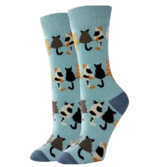 Women's Caturday crew socks in sky blue, flat lay showing assorted lounging cats