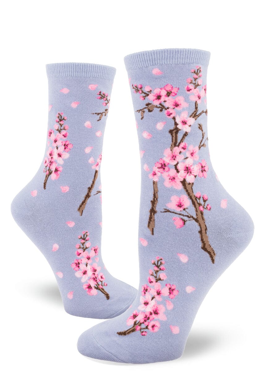 Women's cherry blossom crew socks in lilac with pink blossoms, flat lay