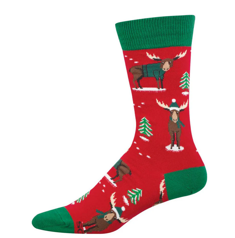 Men's Christmoose crew socks laid flat, red with sweater-wearing moose and evergreen trees on a snowy background