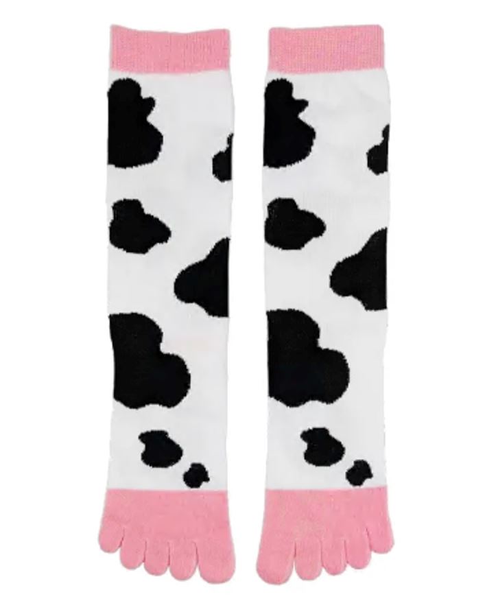 Women's cow print toe socks in white and pink, flat lay showing black cow patches and individual toes