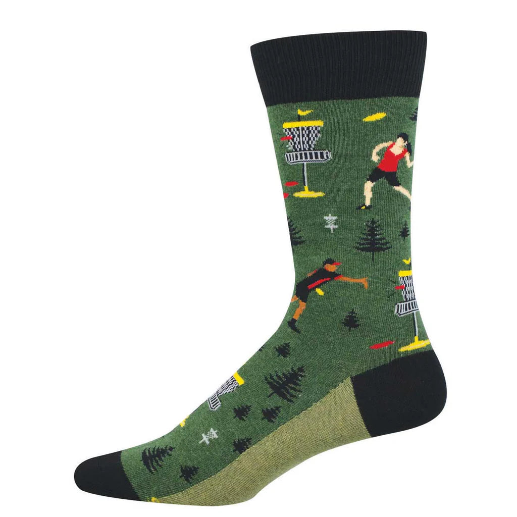 Men's disc golf crew socks laid flat, green with a player, basket, and pine trees