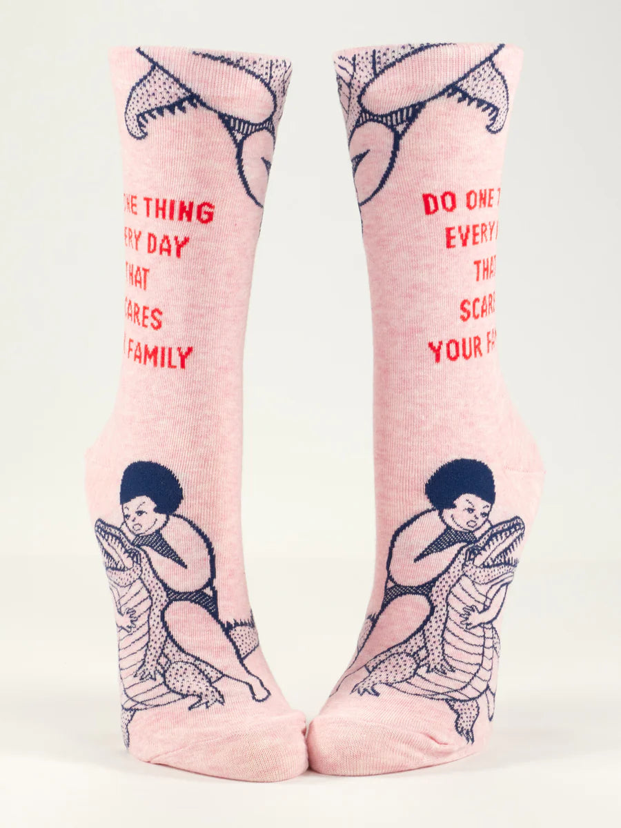 Women's pink alligator crew socks, flat front view showing red text and alligator print