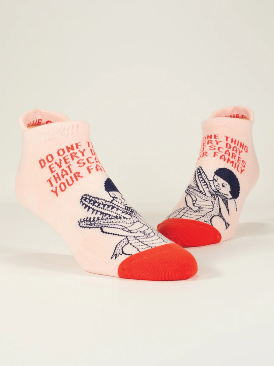 Women's pink alligator low-cut socks, flat side view showing red toe